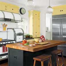 kitchen with yellow cabinets and center island