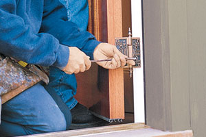 fixing a sticking wood entry door