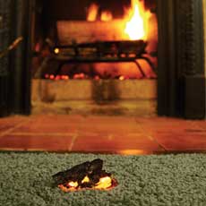 fireplace ember on carpet