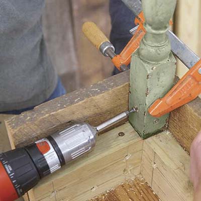 Attaching the spindle legs to the apron's front