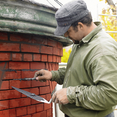 Danny Palousek repointing brick