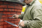 Danny Palousek repointing brick