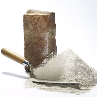 still image of brick with trowel covered in a mound of hydraulic lime