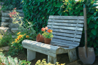 finished garden bench with garden tools