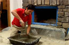 this old house technical editor mark powers installing a stone veneer fireplace surround