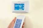 a programmable thermostat with a hand-held remote