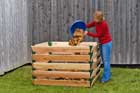 woman empties compost into her Lee Valley compost bin
