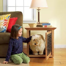 little girl petting a dog in a pet crate that doubles as a side table