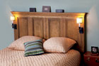 an interior door made into a headboard