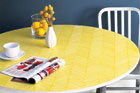 a finished table with a herringbone pattern combed onto it in yellow