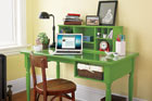 a finished desk with a storage hutch