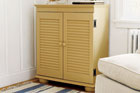 a custom-built cabinet from a bookshelf and shutters