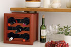 a wine rack made from a planter box
