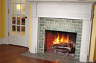 a finished tiled fireplace surround