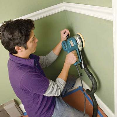 sanding the wall