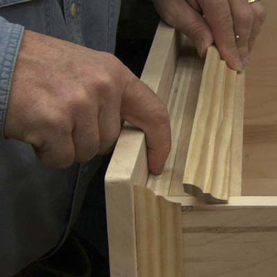 Install bed molding around top