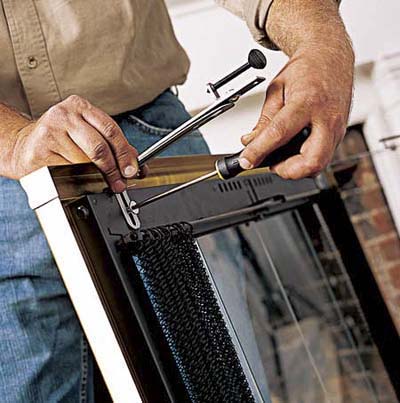 Attaching lintel clamps to door.