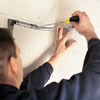 Install a preformed conduit elbow