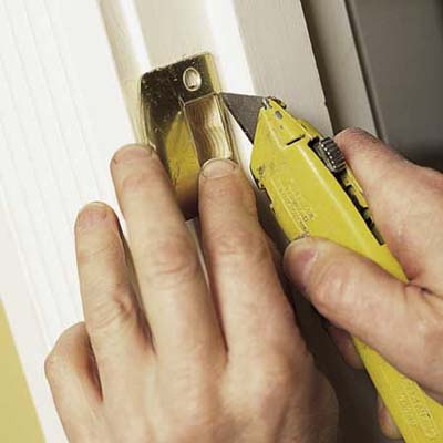 installing the strike plate of a lockset