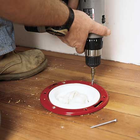 installing the soil pipe and closet flange