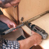 MOUNT THE SLIDES TO THE CABINET