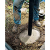 Set the post into the concrete footing