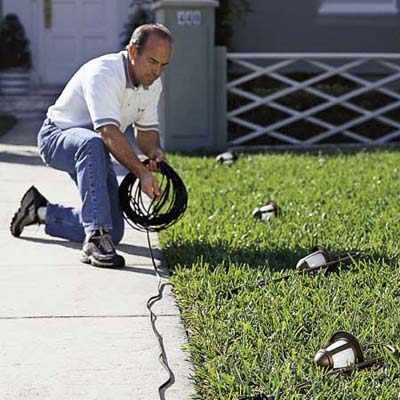 laying out the components of landscape lighting