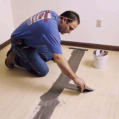 putting down the underlayment for a self-adhesive tile floor