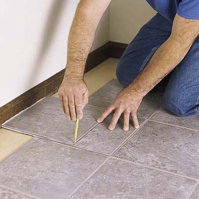 scribing the tiles to fit along the wall