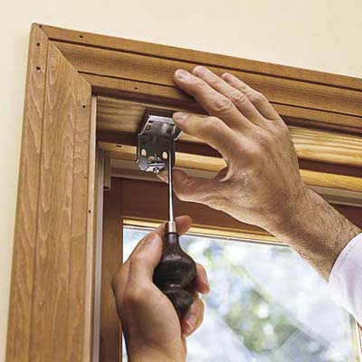 attaching a mounting bracket for a window shade