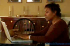 woman looking for bargains on home materials on her laptop computer