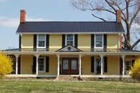 yellow house seen from the front
