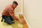 This Old House general contractor Tom Silva shares tips and techniques for putting down a floating floor