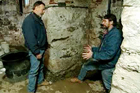 Master carpenter Norm Abram demonstrates how to install basement drainage