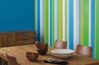 a wall recently painted with colored stripes