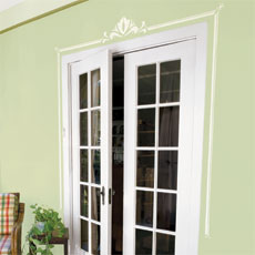 set of French doors with a decorative stenciled border