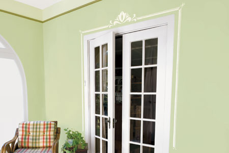 set of French doors with a decorative stenciled border