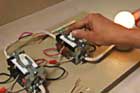 Host Kevin O'Connor and professional electrician demonstrate how to install a new 3-way switch