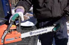 Roger Cook demonstrates chainsaw safety