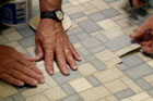 patching a damaged section of vinyl flooring with section of same vinyl pattern