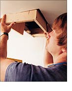 Push the chase - an open-ended 11-square-inch box - into the ceiling cavity.