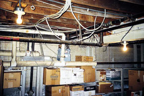 unfinished basement with utility and water issues 