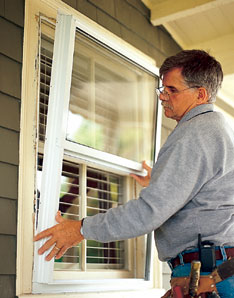 tipping storm window in place