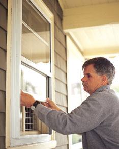 raising and lowering the storm window