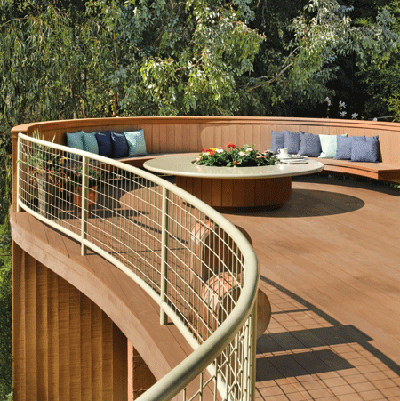A swooping steel railing follows the dramatic curve of the deck.