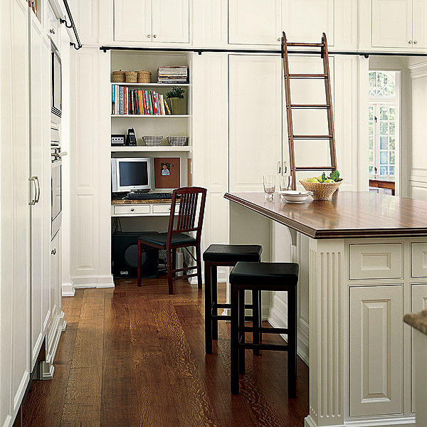 50 linear feet of upper cabinets provide storage for infrequently used kitchen gear