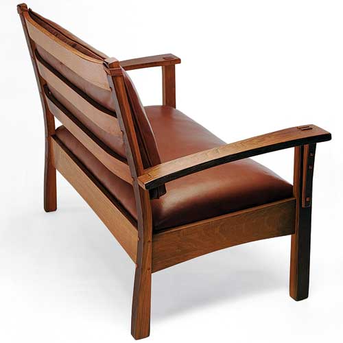 Vintage wood repurposed as a love seat.