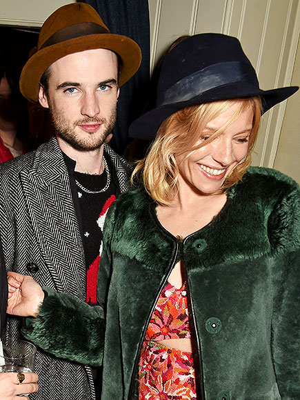 Sienna Miller and Ex Tom Sturridge out at Christmas Party : People.com