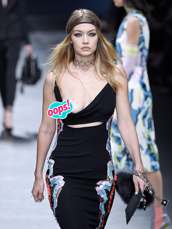 Splurge: Gigi Hadid's New York V Files Orange Cropped Bomber, Versace  Palazzo Empire black bag and Vans Love Me Daisy Sneaker – Fashion Bomb Daily