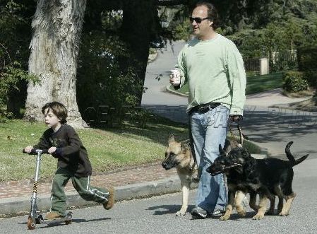 Jared Belushi In Jim Belushi And Kids Riding A Scooter In